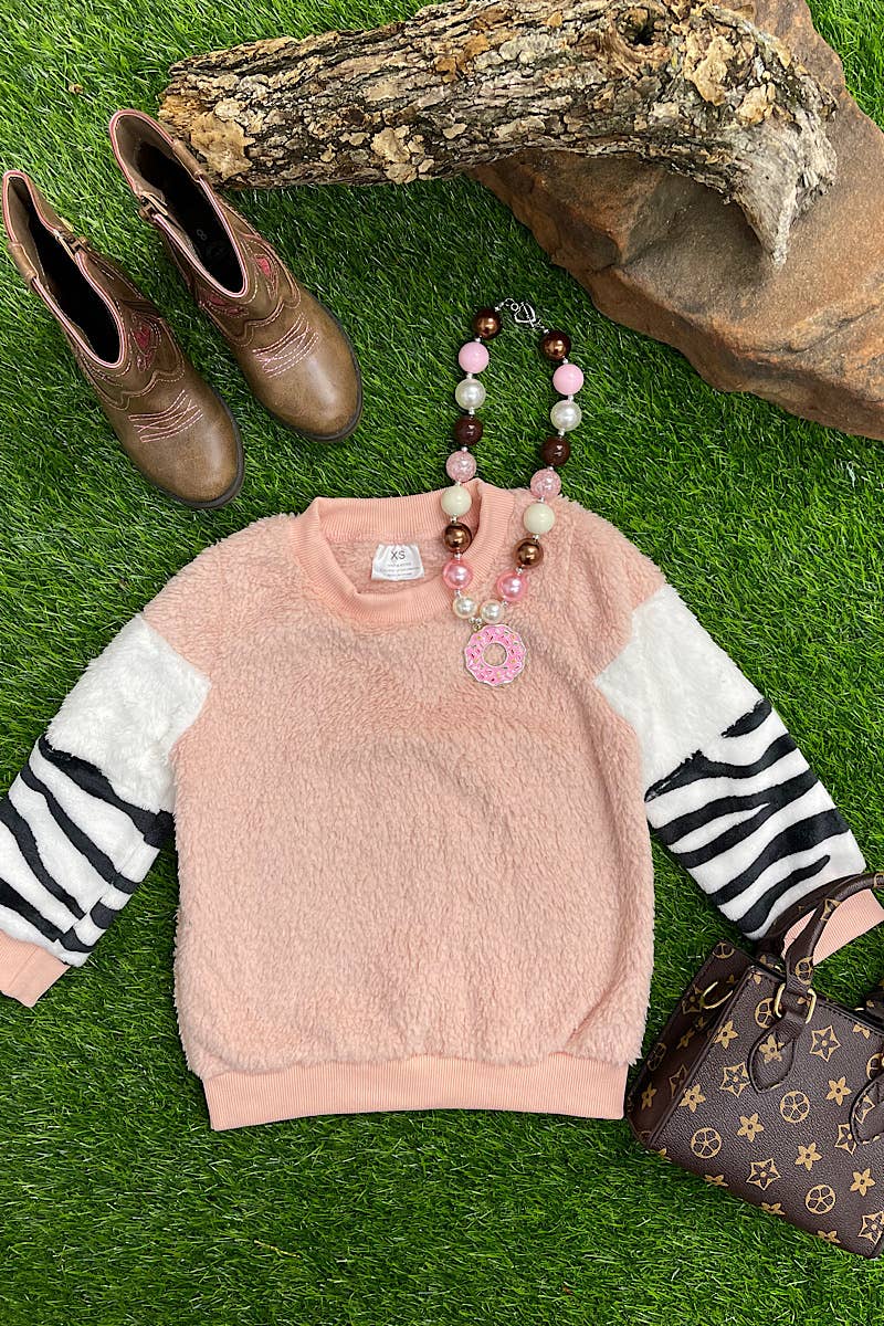 PINK FLEECE SWEATER W/ZEBRA PRINT SLEEVES. TPG651722021SOL: 2XS