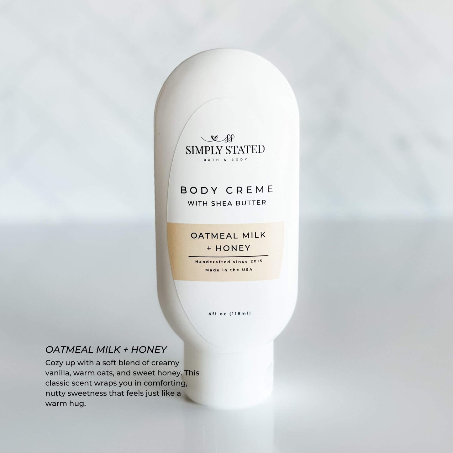 Simply Stated Body Creme in Oatmeal Milk + Honey scent. A 4oz squeeze bottle infused with shea butter and a comforting blend of creamy vanilla, warm oats, and sweet honey for silky-smooth skin.