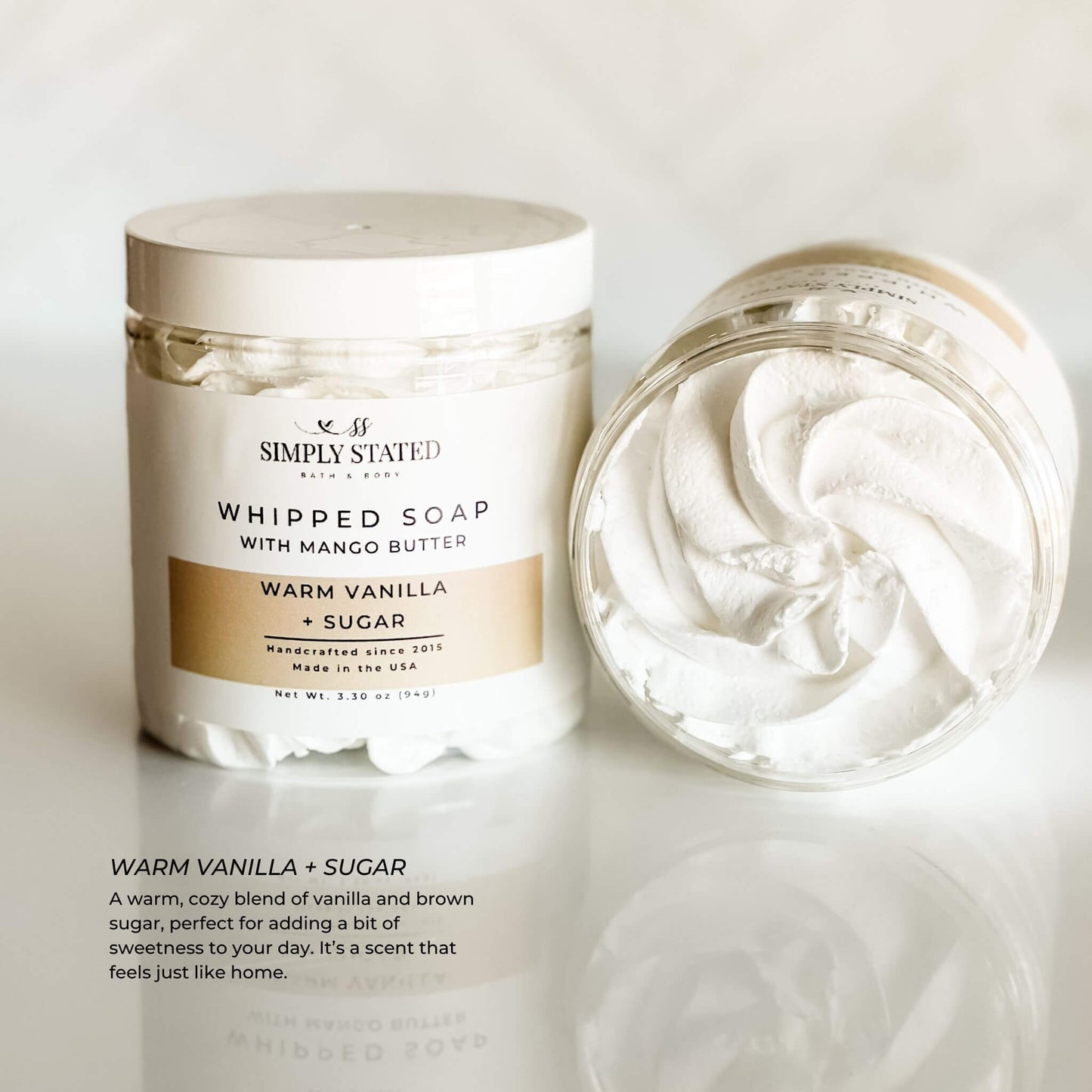 Signature Line Whipped Soap Warm Vanilla + Sugar, 8oz jar, a cozy whipped soap blending vanilla and brown sugar, enriched with mango butter for an indulgent and soothing bath experience.